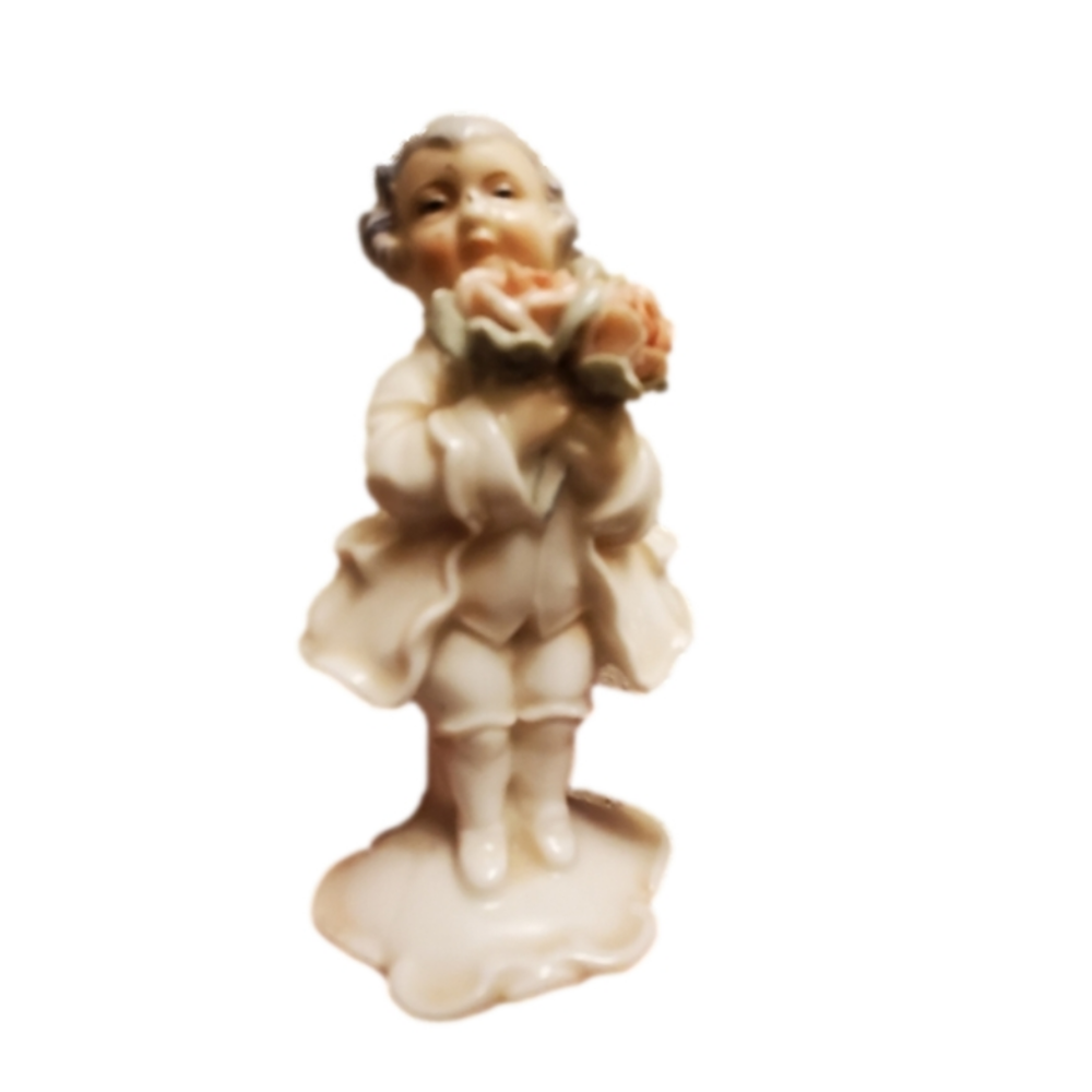 Vintage figurine person holding bouquet